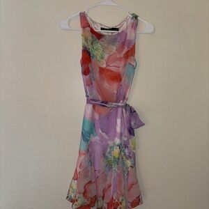 Flowy mid length dress with waist tie